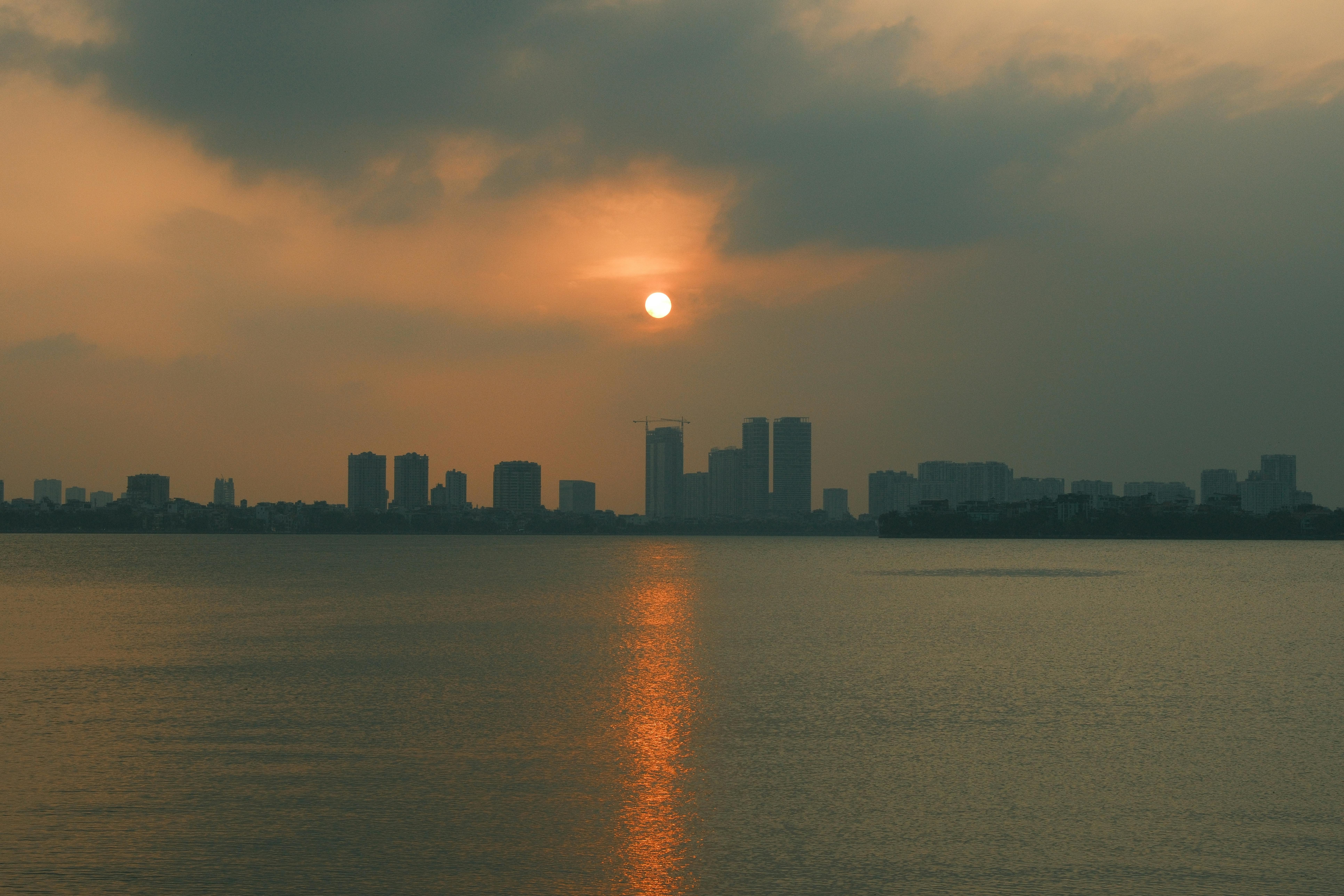 Urban Cityscape Sunset city skyline wallpaper at sunset, 7728x5152